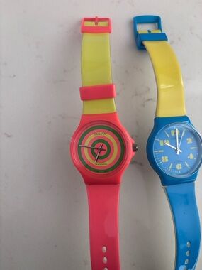 Geneva Pink and Yellow Spiral Dial Watch set of two. Both need new batteries